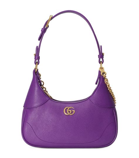 gucci purple purse.